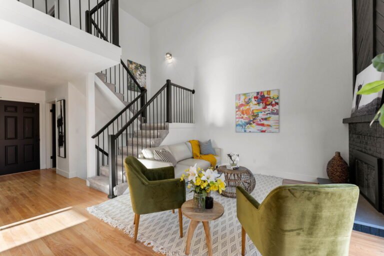 Custom stairs Denver CO project - black iron railing and staircase installed by All Pro Renovations