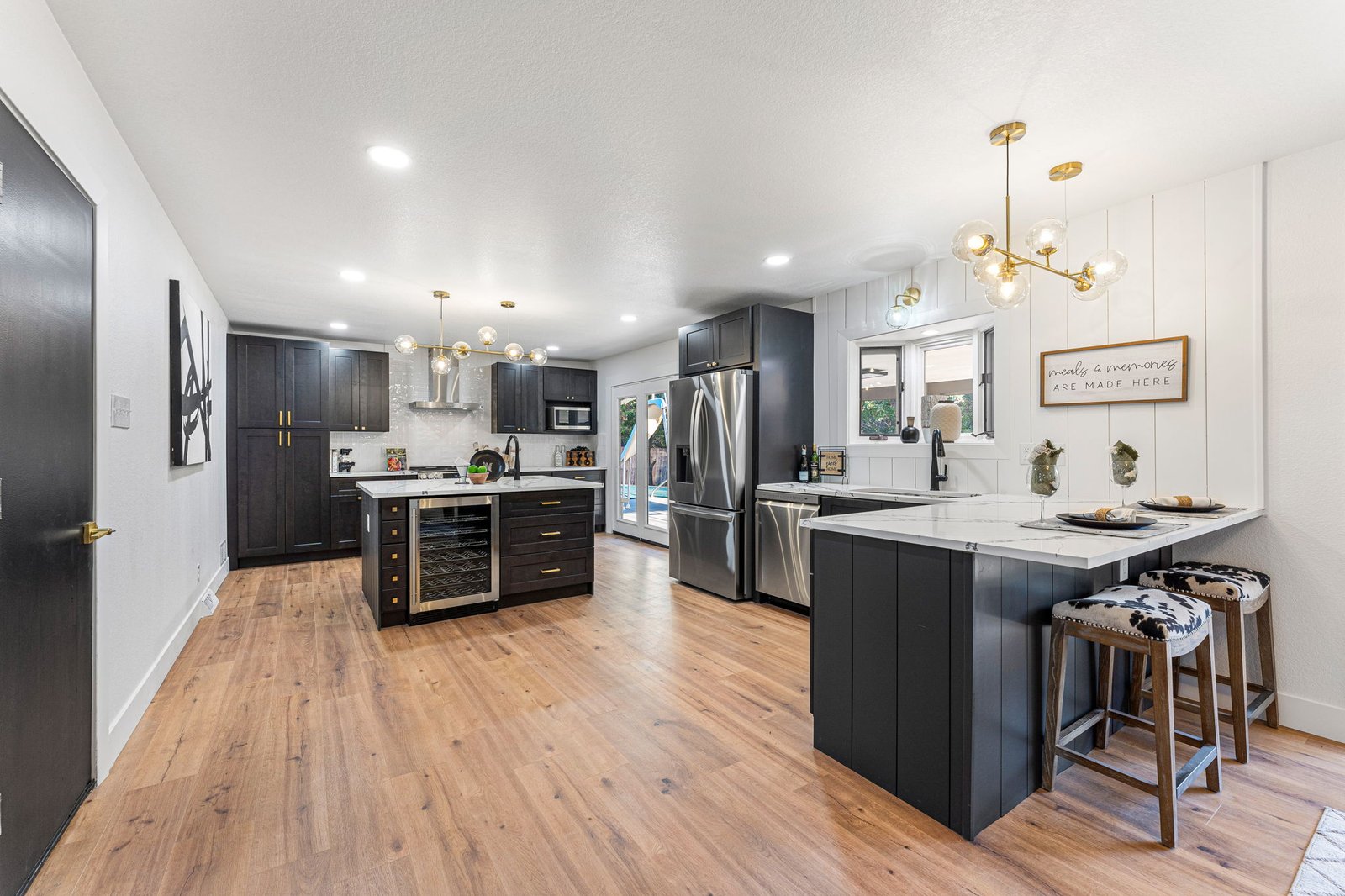 Remodeled kitchen with wine fridge after renovation in Denver, CO